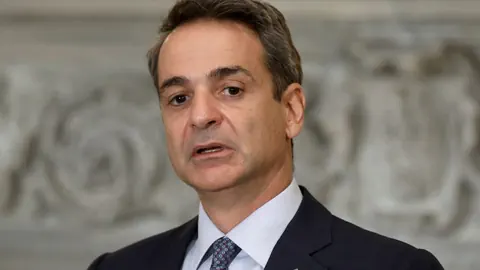 Mitsotakis.