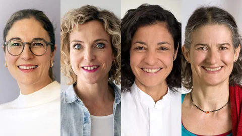 Portraits von vier lächelnden Frauen nebeneinander.