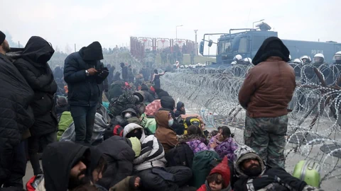 Migranten an der polnisch-belarussischen Grenze im November 2021. 