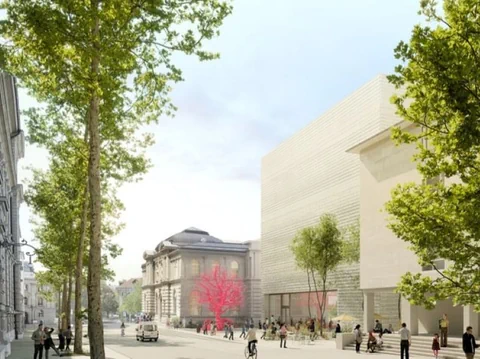 Strassenszene mit modernen Gebäuden, Bäumen und Menschen, die gehen.
