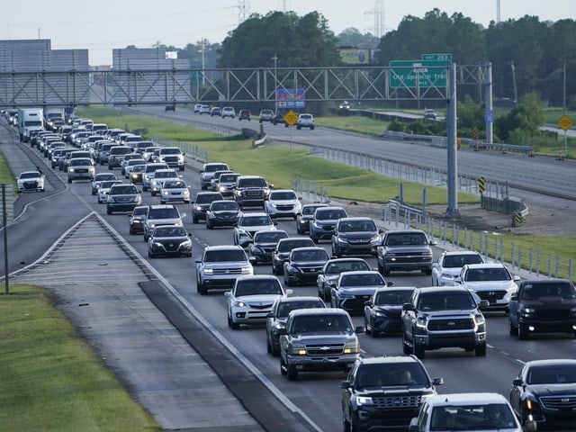 Heavy traffic on the three lane highway