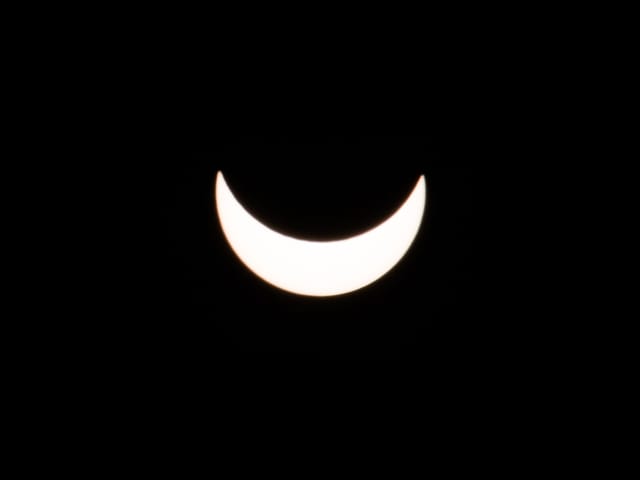Am schwarzen Himmel ein Smiley
