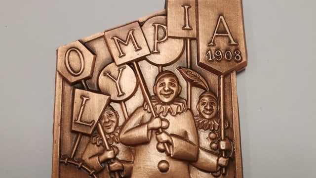 Die Clique Olympia lanciert eine eigene Plakette. Die Clique Olympia lanciert eine eigene Plakette.
