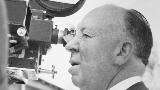Mann hinter der Filmkamera Mann hinter der Filmkamera