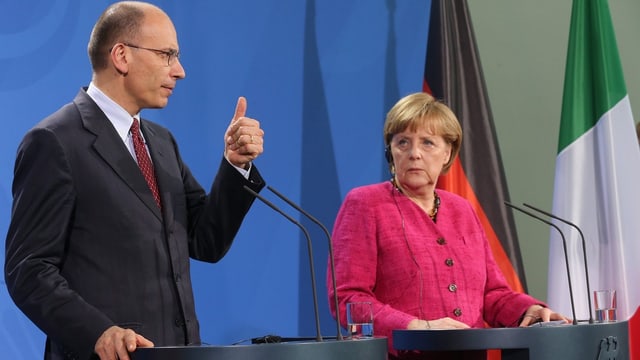 Letta und Merkel an einer Medienkonferenz. Letta und Merkel an einer Medienkonferenz.