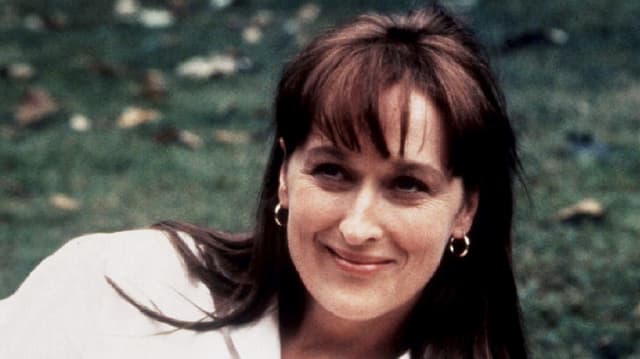 Meryl Streep in ihren Dreissigern lächelt. Meryl Streep in ihren Dreissigern lächelt.