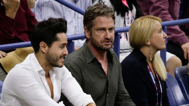 Gerard Butler sitzt im Publikum. Gerard Butler sitzt im Publikum.