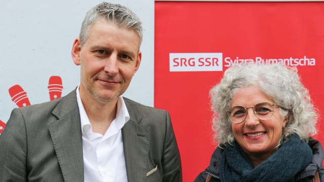Il president partent e la nova presidenta dal cussegl dal public, Roger Tuor e Carmen Dedual. Il president partent e la nova presidenta dal cussegl dal public, Roger Tuor e Carmen Dedual.