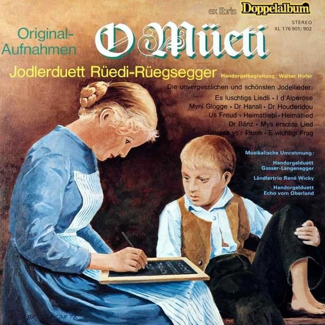 Ein Bild im Stil der Ankerbilder. Eine Mutter und ein Sohn sitzen beieinander, die Mutter schreibt etwas auf eine Schiefertafel. Ein Bild im Stil der Ankerbilder. Eine Mutter und ein Sohn sitzen beieinander, die Mutter schreibt etwas auf eine Schiefertafel.