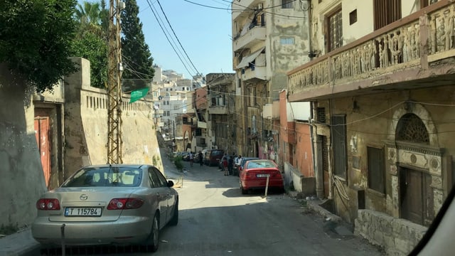 Gasse mit zerfallenden Häusern in Tripoli. Gasse mit zerfallenden Häusern in Tripoli.