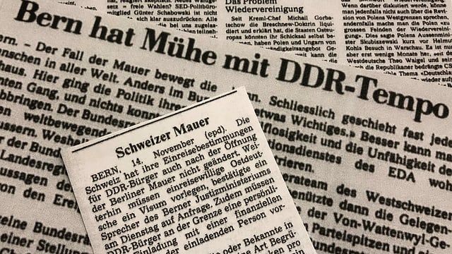 Zeitungsartikel mit Thema Schweiz und der Mauerfall. Zeitungsartikel mit Thema Schweiz und der Mauerfall.