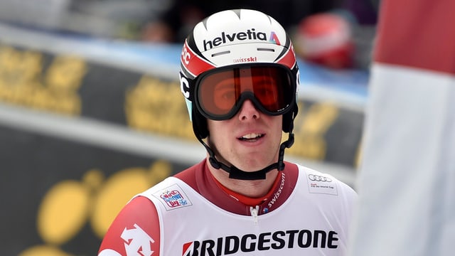il skiunz Marc Gisin cun chapelina ed egliers. il skiunz Marc Gisin cun chapelina ed egliers.