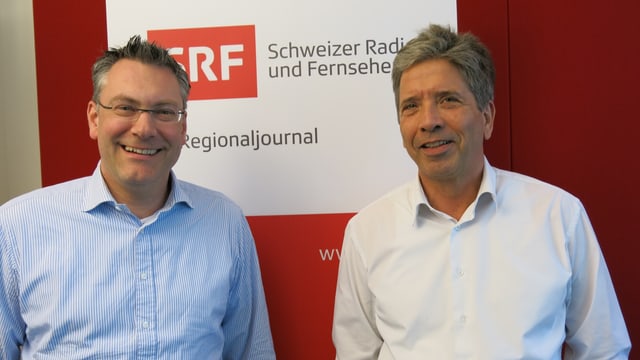 Eich und Goepfert vor SRF Logo Eich und Goepfert vor SRF Logo