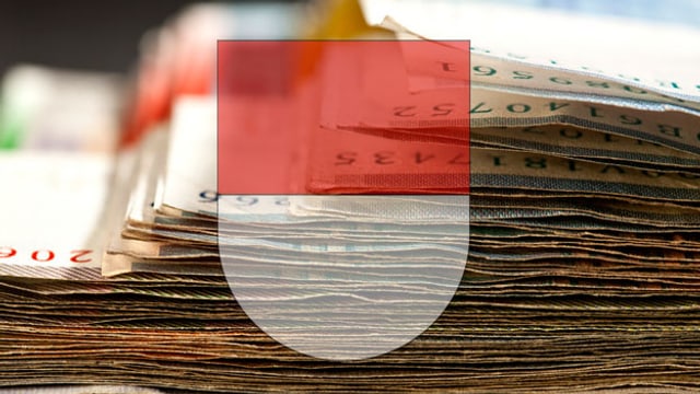 Ein Bündel Banknoten, davor das Solothurner Kantonswappen (Montage) Ein Bündel Banknoten, davor das Solothurner Kantonswappen (Montage)
