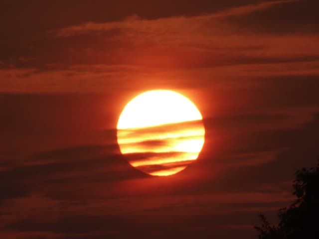 Sonnenaufgang an einem Hochsommertag