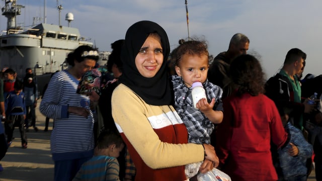 Syrische Frau mit Säugling. Syrische Frau mit Säugling.