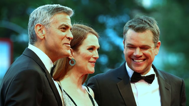 Clooney, Moore und Damon in Abendgarderobe. Clooney, Moore und Damon in Abendgarderobe.