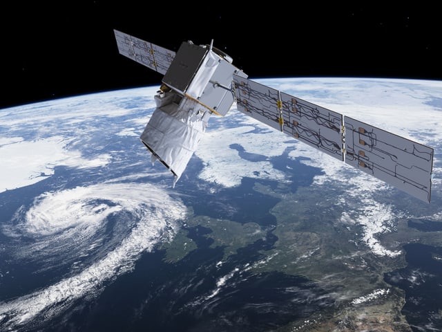 Satellit mit Blick auf eine Wolkenwirbel Satellit mit Blick auf eine Wolkenwirbel
