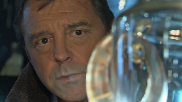 Silvio Denz' Gesicht hinter Glas. Silvio Denz' Gesicht hinter Glas.