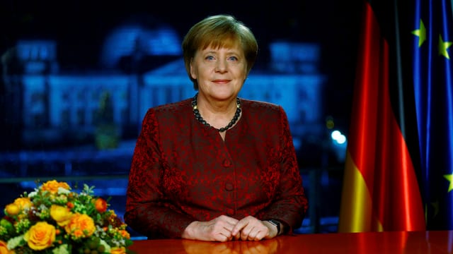 Ein Bild vom vorproduzierten Video von Merkels Rede. Ein Bild vom vorproduzierten Video von Merkels Rede.
