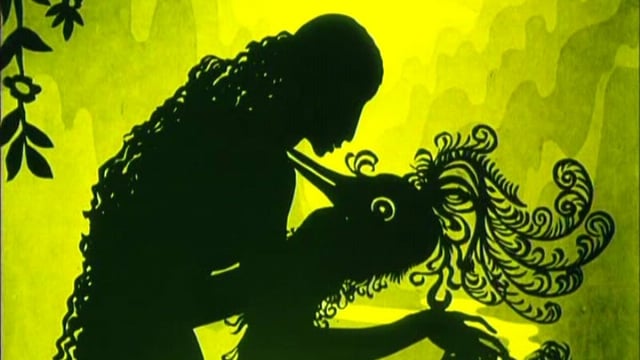 Eine Frau tanzt mit einem Pfau: Schattenriss aus einem Film von Lotte Reiniger. Eine Frau tanzt mit einem Pfau: Schattenriss aus einem Film von Lotte Reiniger.