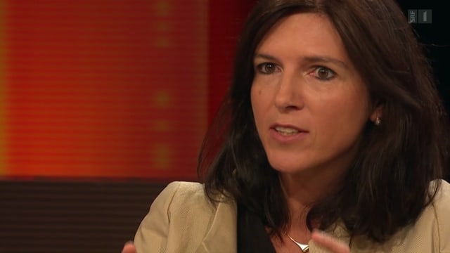 Büchler spricht in einer TV-Sendung von SRF. Büchler spricht in einer TV-Sendung von SRF.