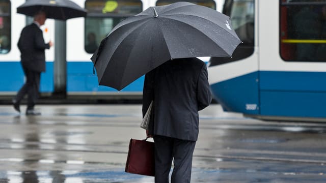 Ein Banker an der Zürcher Bahnhofstrasse Ein Banker an der Zürcher Bahnhofstrasse