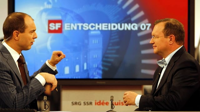 Urs Leuthard und Claude Longchamp während einer Wahlsendung. Urs Leuthard und Claude Longchamp während einer Wahlsendung.