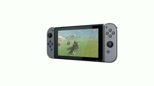 Knöpfe und Sticks links und rechts, dazwischen ein Touchscreen. Knöpfe und Sticks links und rechts, dazwischen ein Touchscreen.