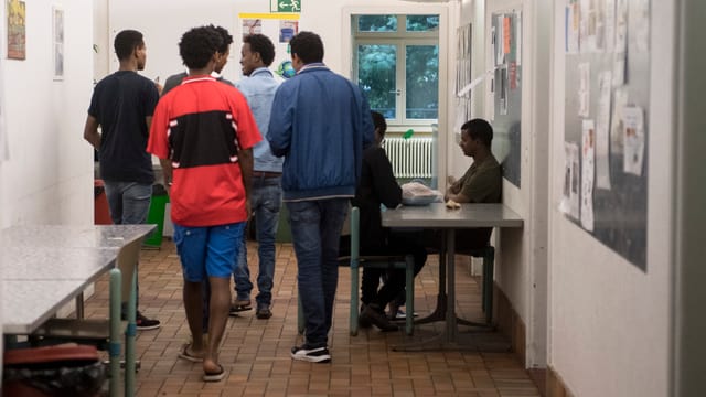 Asylbewerber in einer Unterkunft. Asylbewerber in einer Unterkunft.