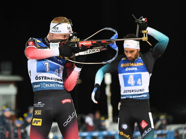 Johannes Thingnes Bö (l.) und Martin Fourcade. Johannes Thingnes Bö (l.) und Martin Fourcade.