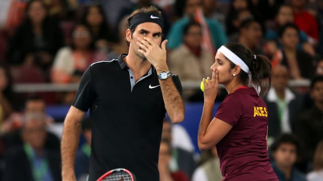 Federer und Mirza sprechen miteinander Federer und Mirza sprechen miteinander