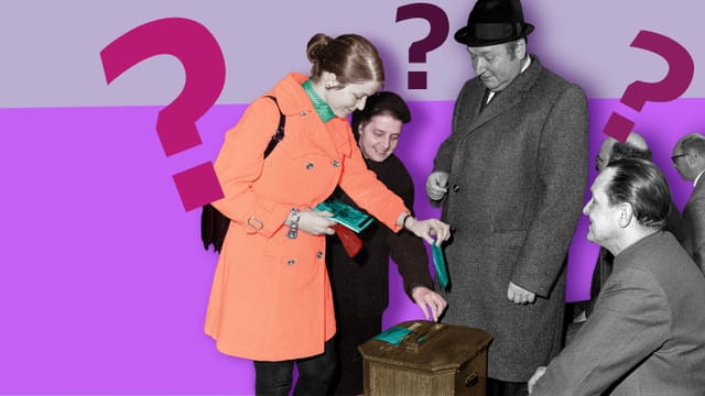 eine Frau legt einen Wahlzettel in die Urne, zwei Männer schauen zu
