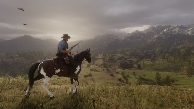Ein Mann sitzt auf seinem Pferd. Ein Mann sitzt auf seinem Pferd.