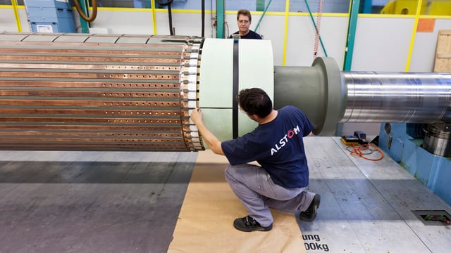 Mitarbeiter der Alstom. Mitarbeiter der Alstom.