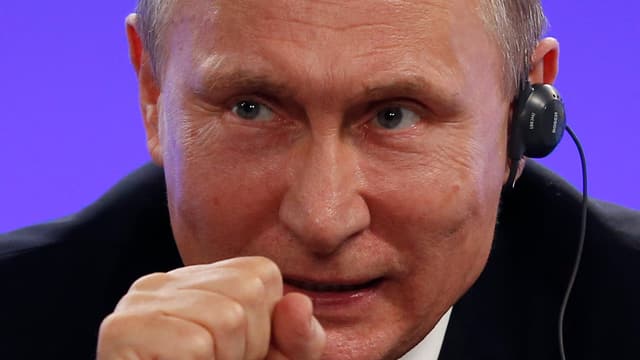 Putin mit Köpfhörer.