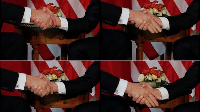 Nahaufnahme vom Händedruck zwischen Trump und Macron. Nahaufnahme vom Händedruck zwischen Trump und Macron.