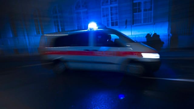 Polizeiauto mit Blaulicht Polizeiauto mit Blaulicht