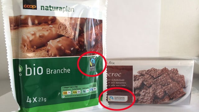 Zwei unterschiedliche Schokoladenprodukte mit unterschiedlichen Havelaar-Logos Zwei unterschiedliche Schokoladenprodukte mit unterschiedlichen Havelaar-Logos