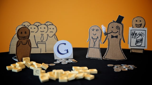 Pappmänchen, Münzen und Scrabble-Steine als Modell für Akteure, Geld- und Informationsflüsse bei Online-News. Pappmänchen, Münzen und Scrabble-Steine als Modell für Akteure, Geld- und Informationsflüsse bei Online-News.