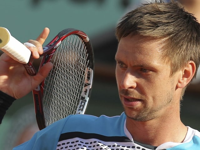 Robin Söderling mit dem Racket in der Hand Robin Söderling mit dem Racket in der Hand