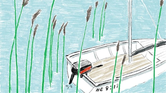 Ein Boot auf dem Wasser zwischen Schilf. Ein Boot auf dem Wasser zwischen Schilf.
