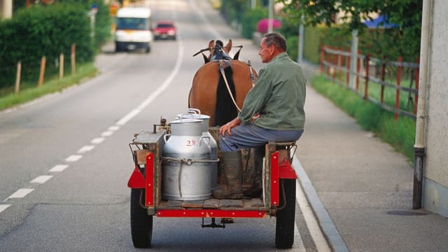 Pur cun ina brenta da latg e car e cavagl Pur cun ina brenta da latg e car e cavagl