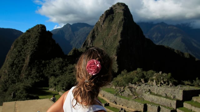 Reisende auf Machu Picchu in Peru Reisende auf Machu Picchu in Peru