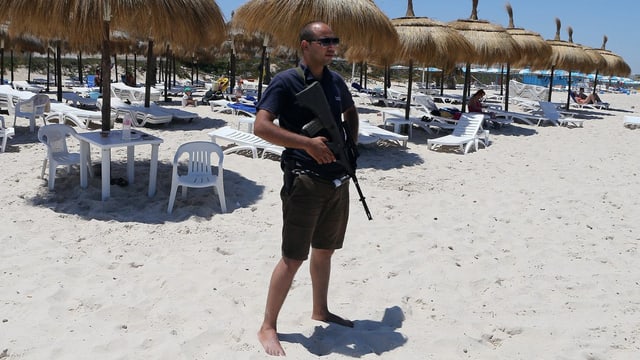 Polizist am Strand Polizist am Strand