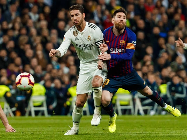 Real Madrid mit Sergio Ramos gegen Barcelona mit Lionel Messi. Real Madrid mit Sergio Ramos gegen Barcelona mit Lionel Messi.