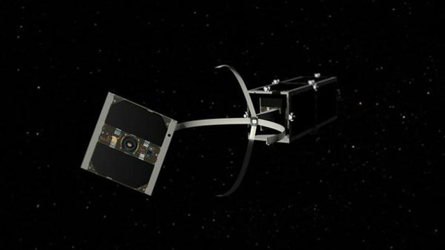 Ein Satelit mit vier Greifarmen. Ein Satelit mit vier Greifarmen.