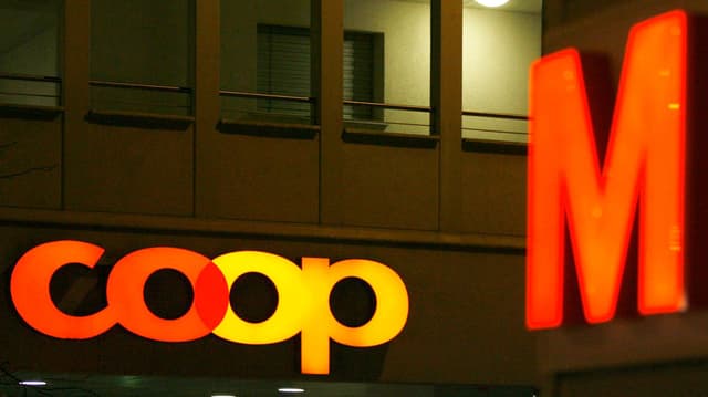 Die Logos von Coop und Migros Die Logos von Coop und Migros