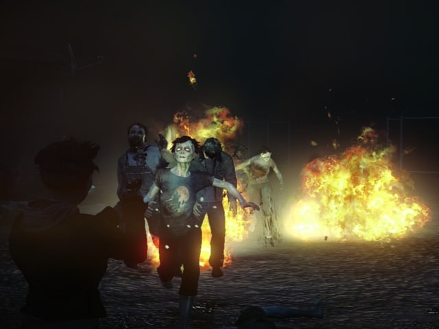 Zombies und eine Feuer-Explosion bei Nacht. Zombies und eine Feuer-Explosion bei Nacht.