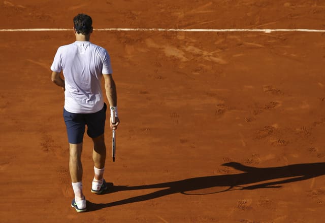 Roger Federer auf sandiger Unterlage Roger Federer auf sandiger Unterlage